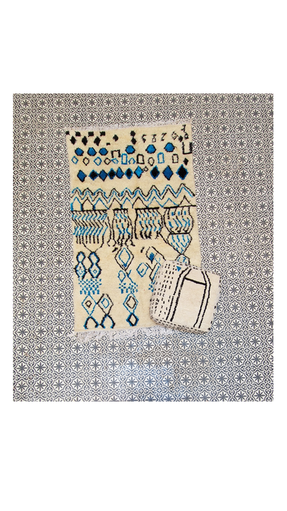 Authentic Azilal Carpet: Handwoven White Wool Rug with Blue Symbols